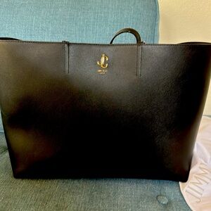 Jimmy chew bag never used. I took the tag off and never used it.